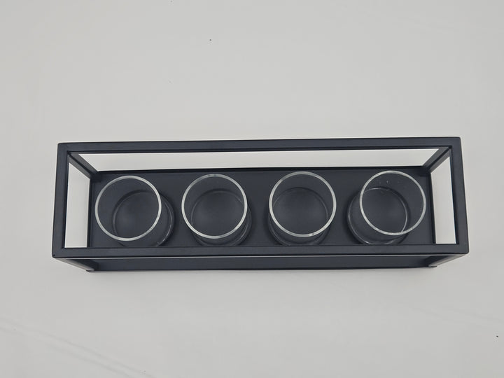 Suport pentru 4 lumânări pastilă, metal și sticlă, 30,5 x 8,8 cm, negru